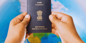 Indian passport with stamps and world map showing rise in global travel rankings.