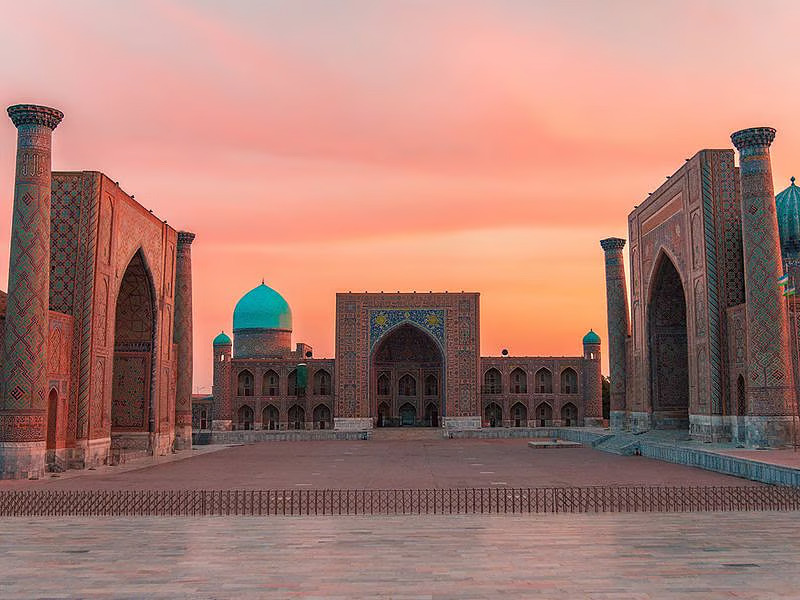 Samarkand’s Registan Square with Islamic architecture and blue domes – visa-free travel destination for UAE residents.